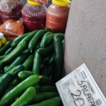 Local farmers sell vegetables and home made tomato paste