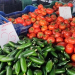 Cucumbers and tomatoes on food market